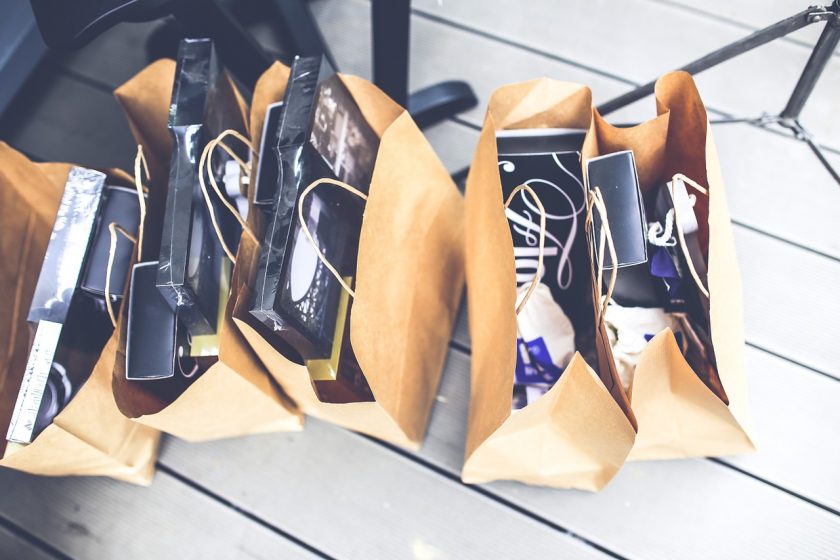 top view of shopping bags full of free clothes