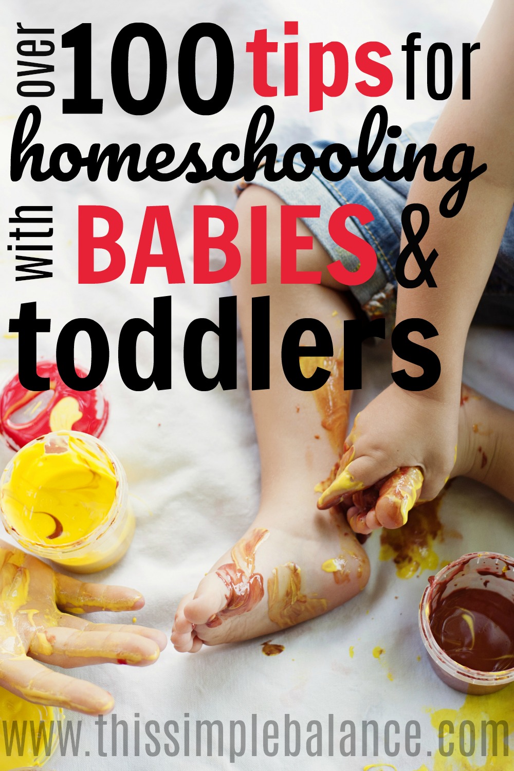 toddler playing with messy finger paints, with text overlay "over 100 tips for homeschooling with babies & toddlers"