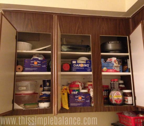 kitchen cabinets, doors open showing contents