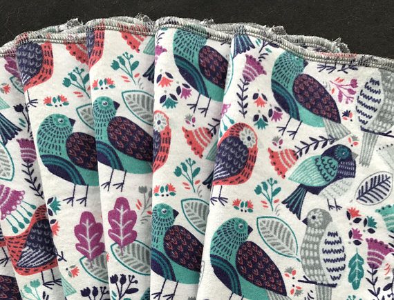 close up of generationME cloth napkins, birds and leaves print