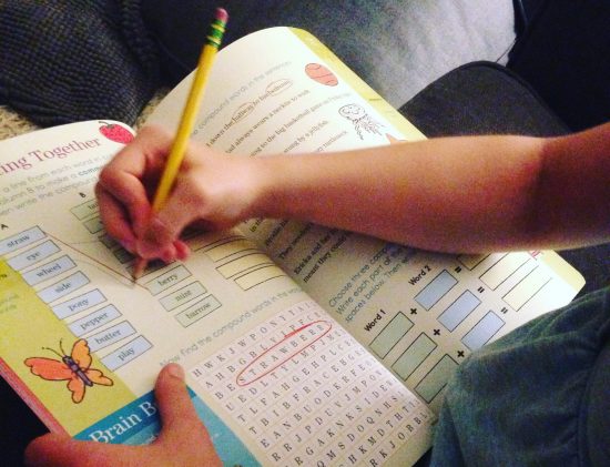 homeschooled third grader doing Brain Quest workbook language arts problems
