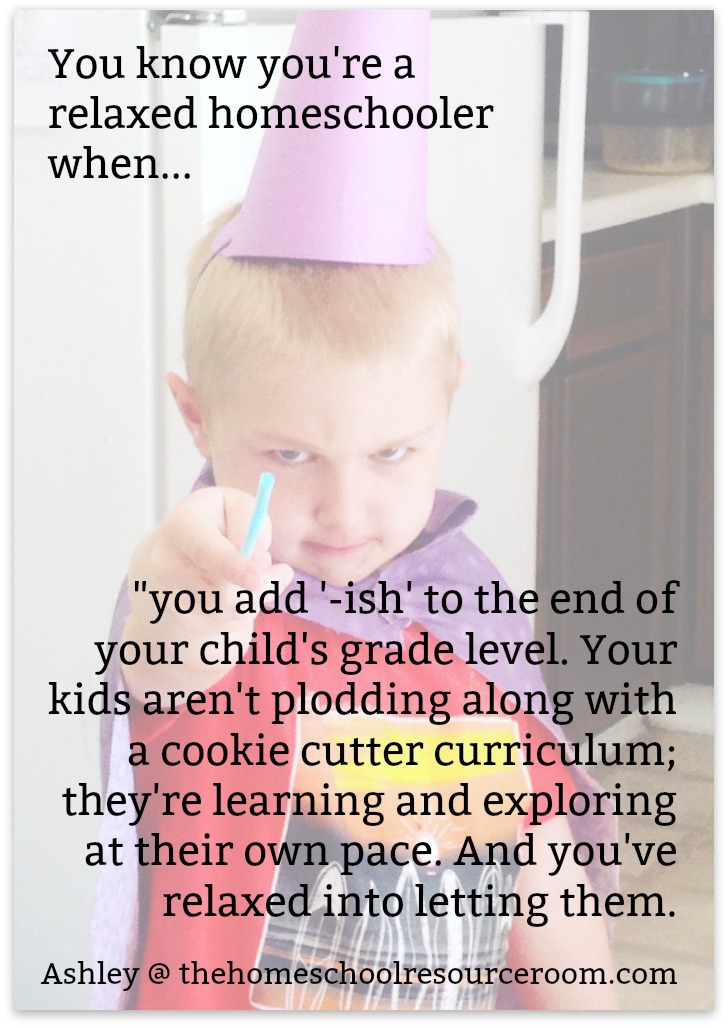 young boy with magician's cape and hat, pointing wand at the camera, with text overlay, "You know you're a relaxed homeschooler when you add 'ish' to the end of your child's grade level. You're kids aren't plodding along with a cookie cutter curriculum; they're learning and exploring at their own pace. And you've relaxed into letting them."