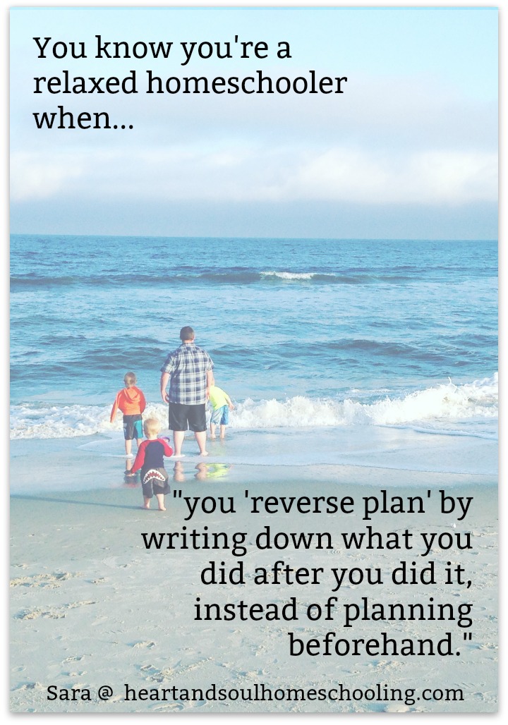 homeschool dad and three kids standing on the beach in front of the ocean, with text overlay, "you know you're a relaxed homeschoolers when you 'reverse plan' by writing down what you did after you did it, instead of planning beforehand."
