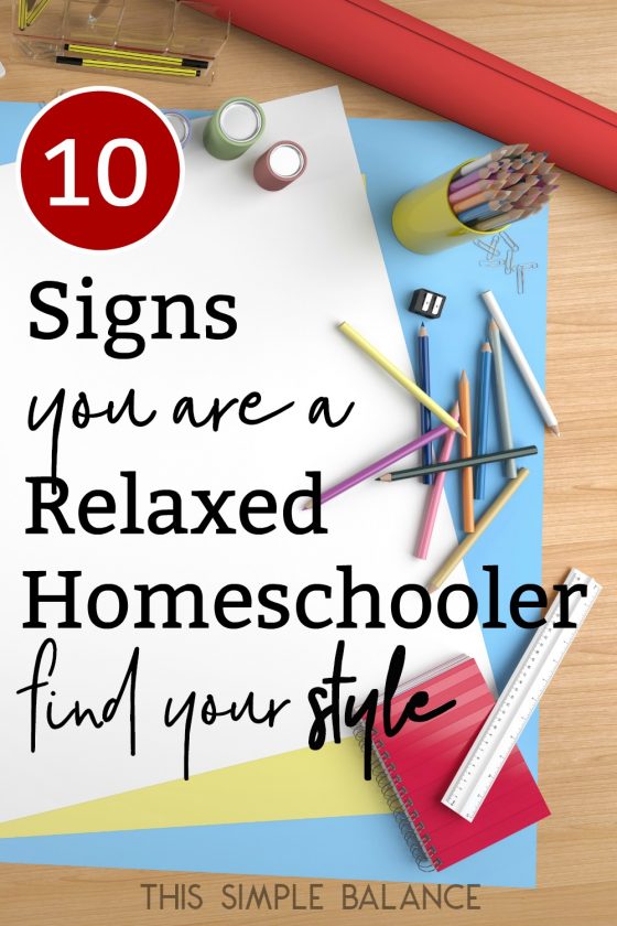 homeschool desk with paper and pencils and office supplies, with text overlay, "10 signs you are a relaxed homeschooler - find your style"
