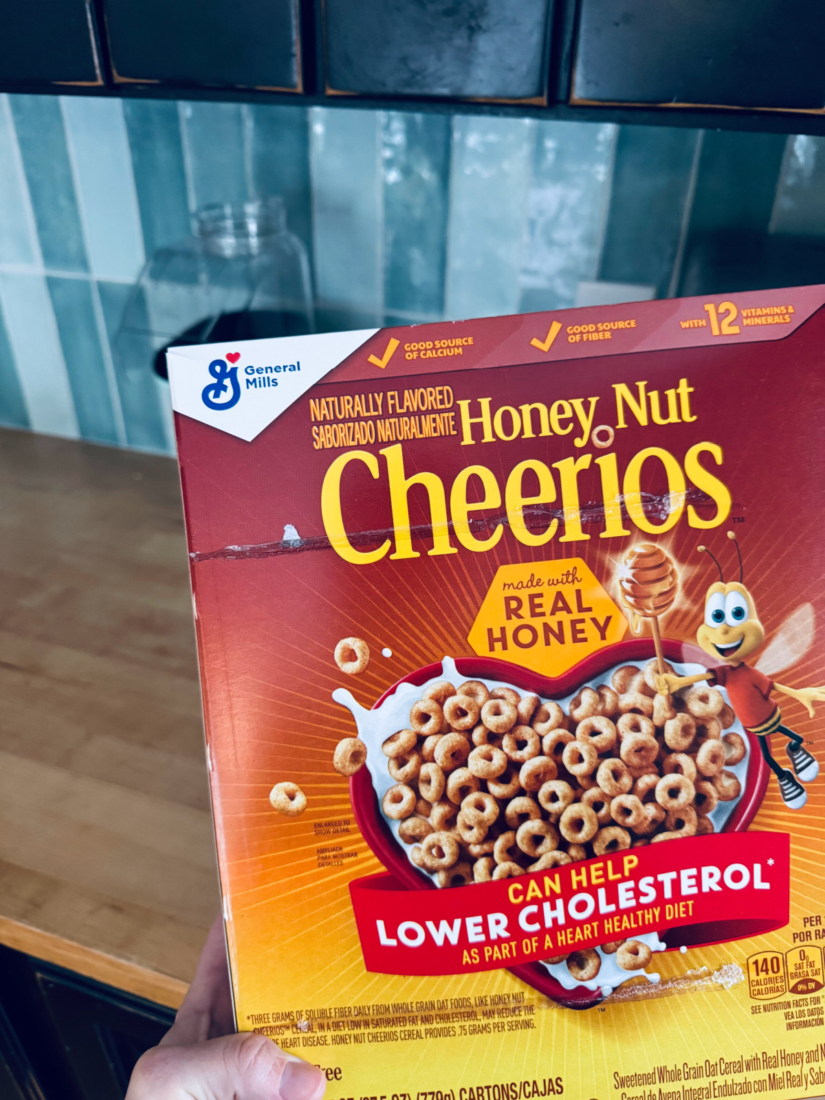 honey nut cheerios cereal box - simple breakfast concept.