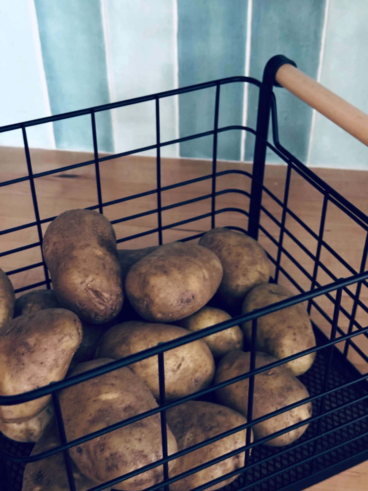 potatoes in metal crate - simple meals concept.