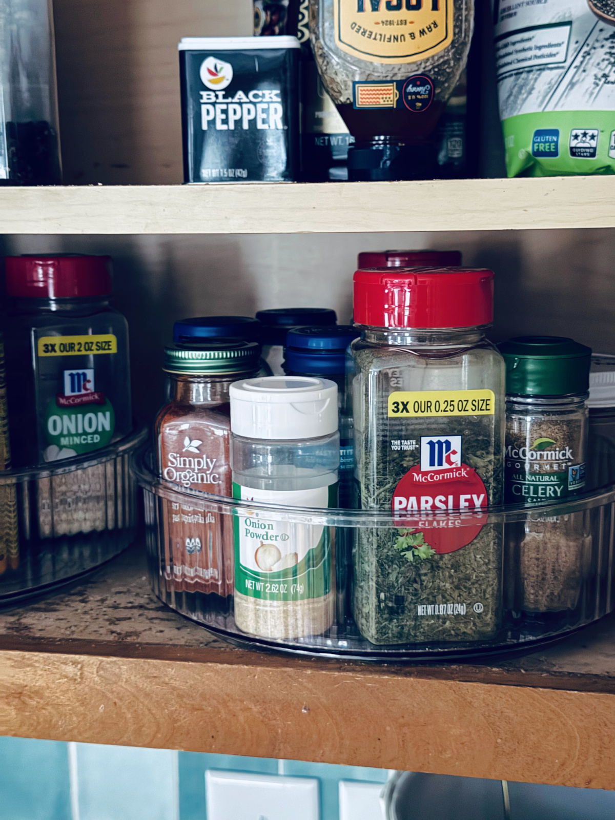 spices in lazy susan on shelf - minimalist meal planning concept.