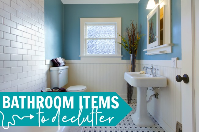 blue and white bathroom with text, "bathroom items to declutter"