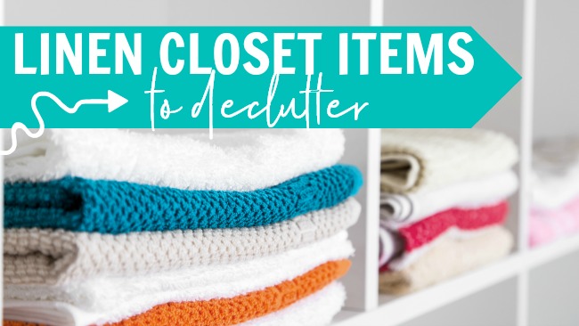 stacked towels, with text "linen closet items to declutter"