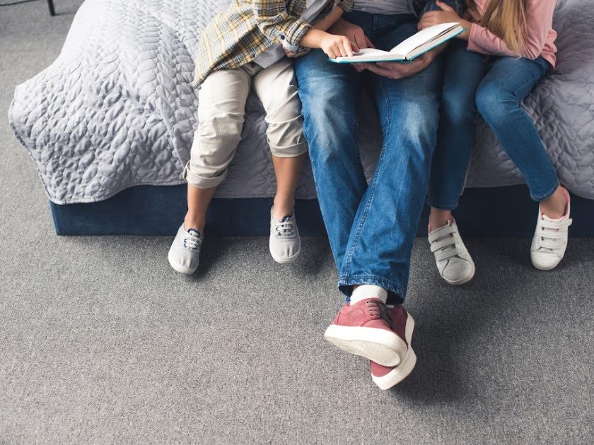 dad homeschooling 4th grade - reading to two kids