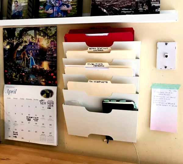 simple family command center with calendar and IKEA magazine wall rack