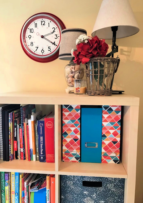 homeschool command center - magazine holders, books, lamp and flowers