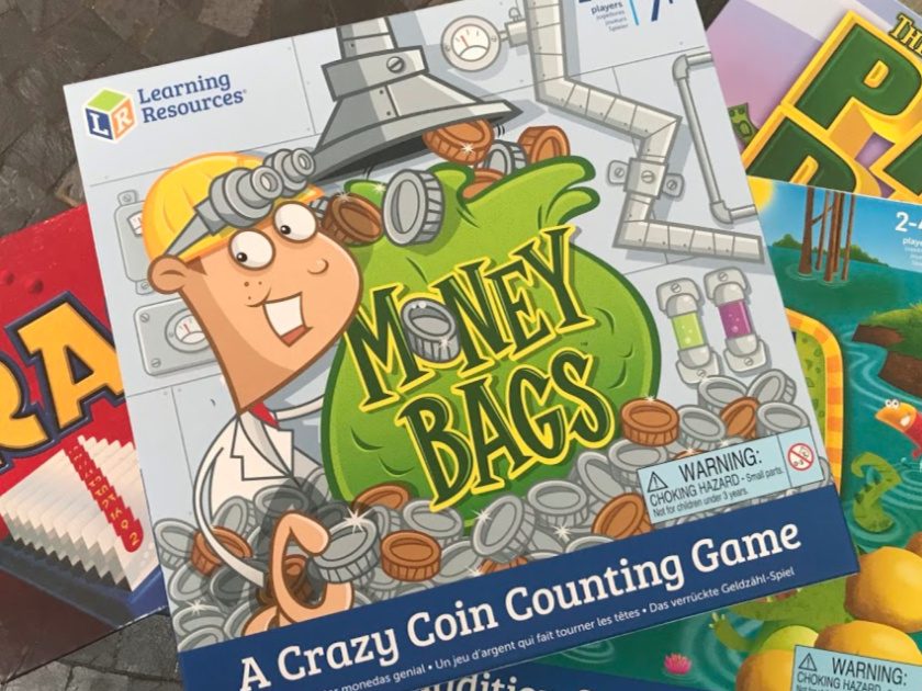 4 math board games stacked on top of each other, Money Bags on top