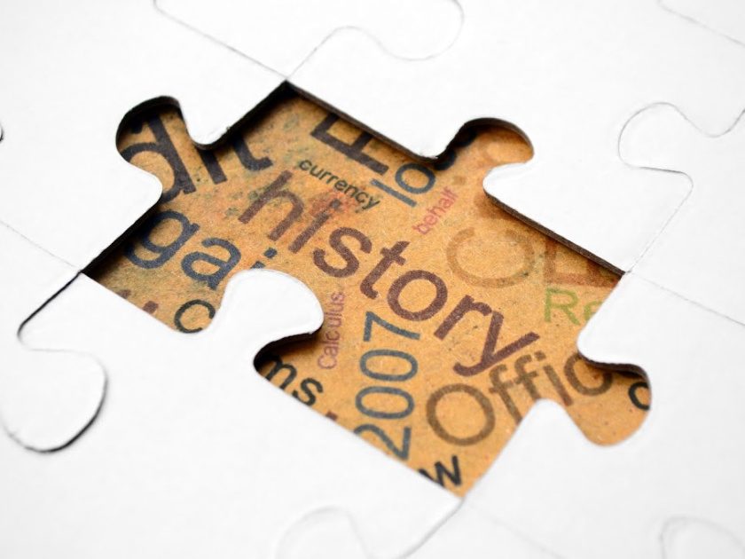 white puzzle with one piece missing and the word "history" underneath