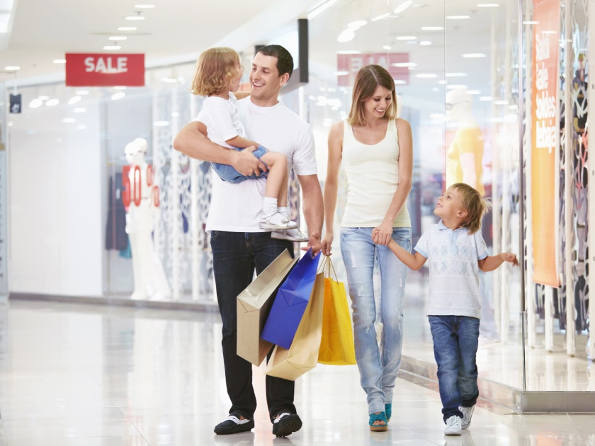 family shopping for sales in the mall