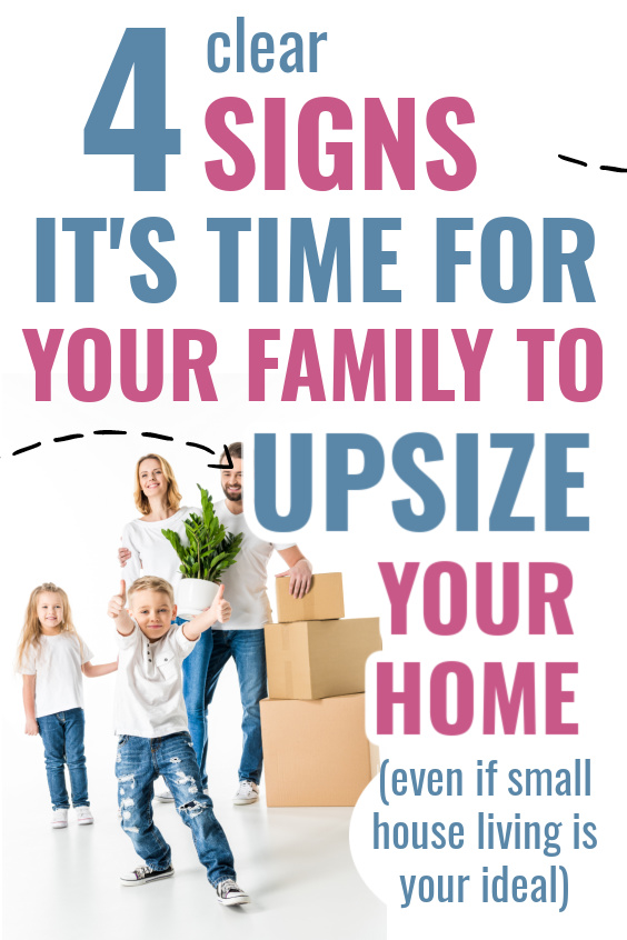 family with two small children and moving boxes and house plant, boy giving thumbs up, with text overlay, "4 signs it's time for your family to upsize your home (even if small house living is your ideal)"