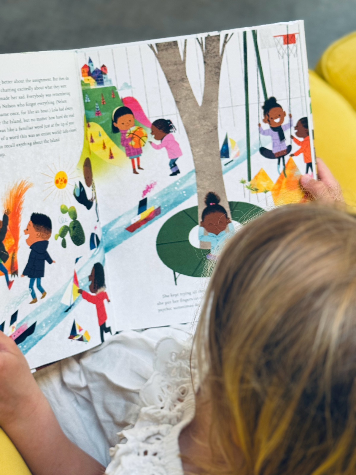 child reading colorful picture book about immigrants.