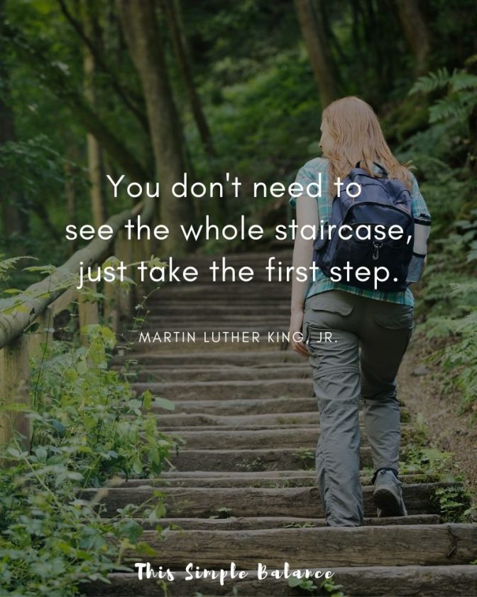 young woman with backpack hiking up stairs in nature, with text overlay, "You don't need to see the whole staircase, just take the first step." Martin Luther King, Jr."
