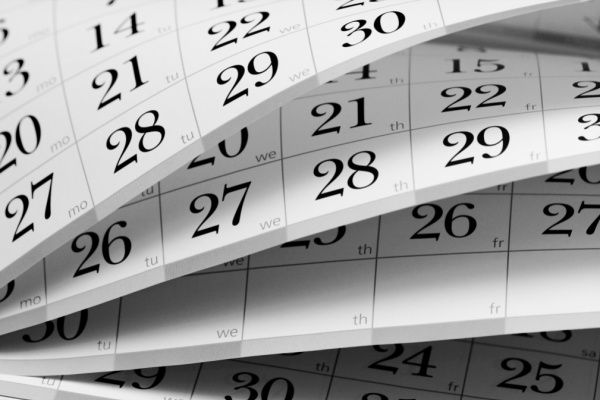 calendar pages up close, fanned out to show multiple months