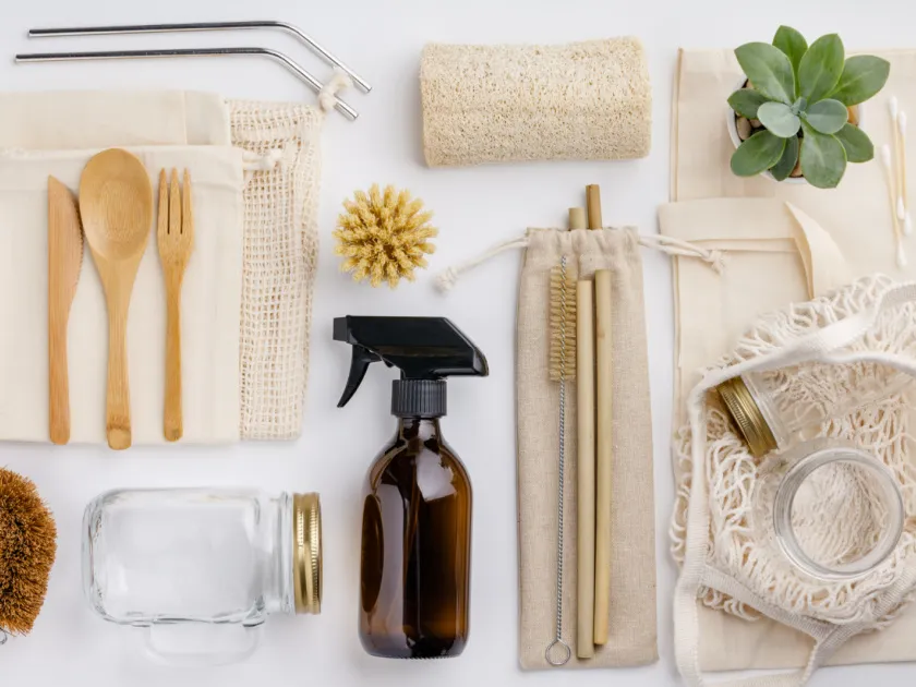 eco friendly, low waste products including amber glass spray bottle and bamboo scrub brush