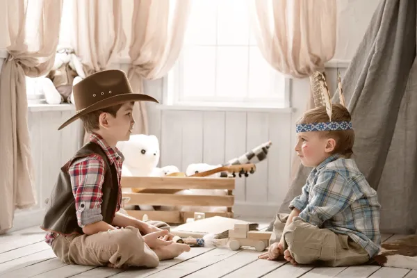 boys playing dress up - cowboy and indian