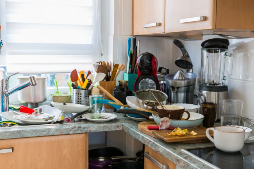 dishes piled up in homeschool family kitchen