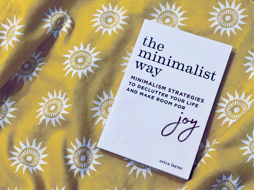 the minimalist way by erica layne book cover, with yellow and white sun background