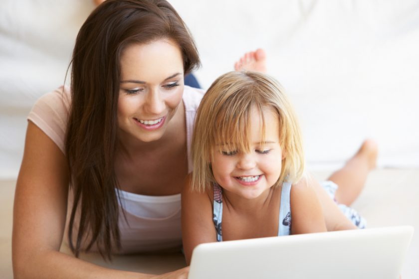 unschooling mom and daughter using laptop together