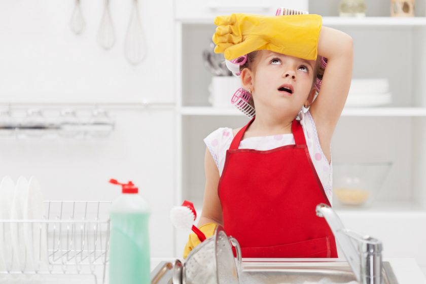 child doing extra chores after fighting with sibling