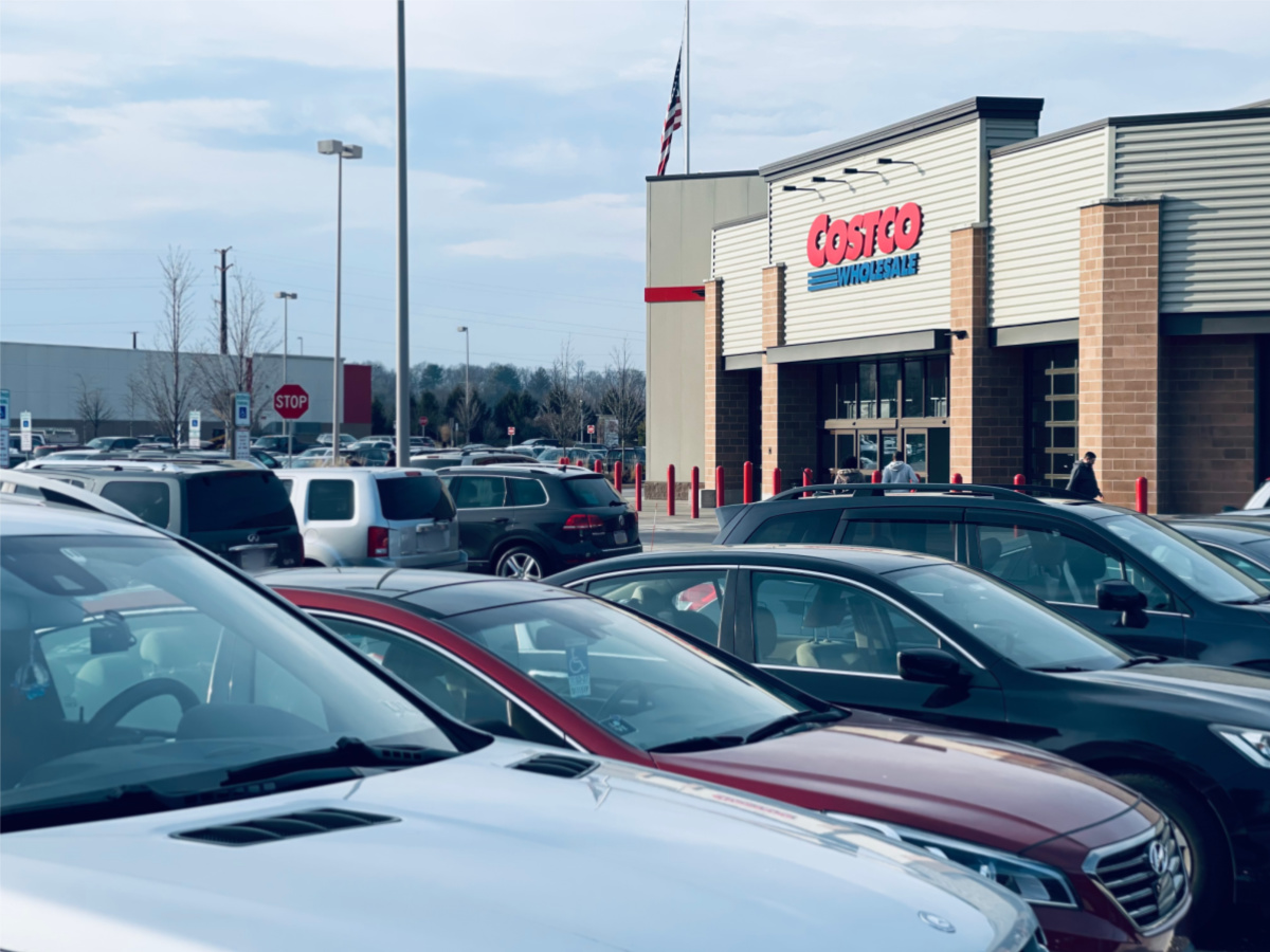 Costco building, view from parking lot filled with cars