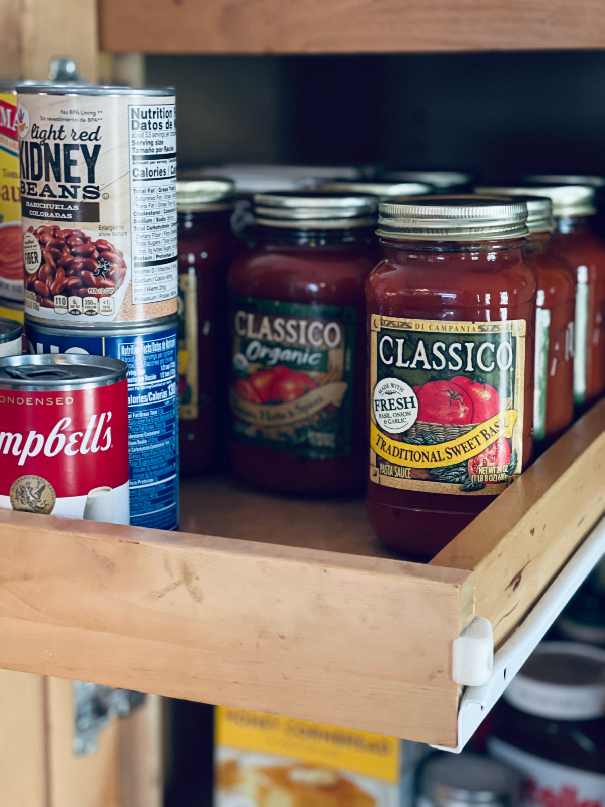 pantry shelf full of on sale Classico pasta sauce