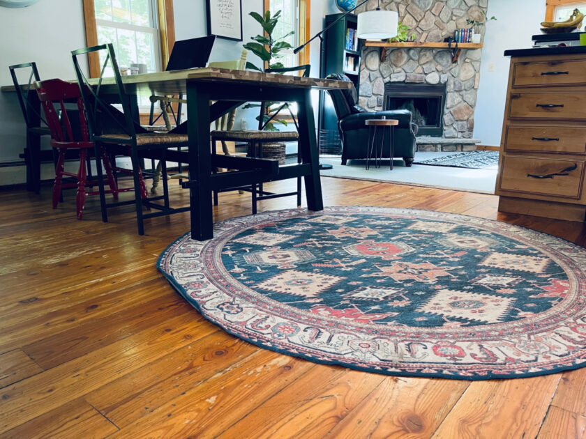 round Ruggable rug on hardwood floor in kitchen