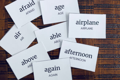 spelling flashcards spread out on table