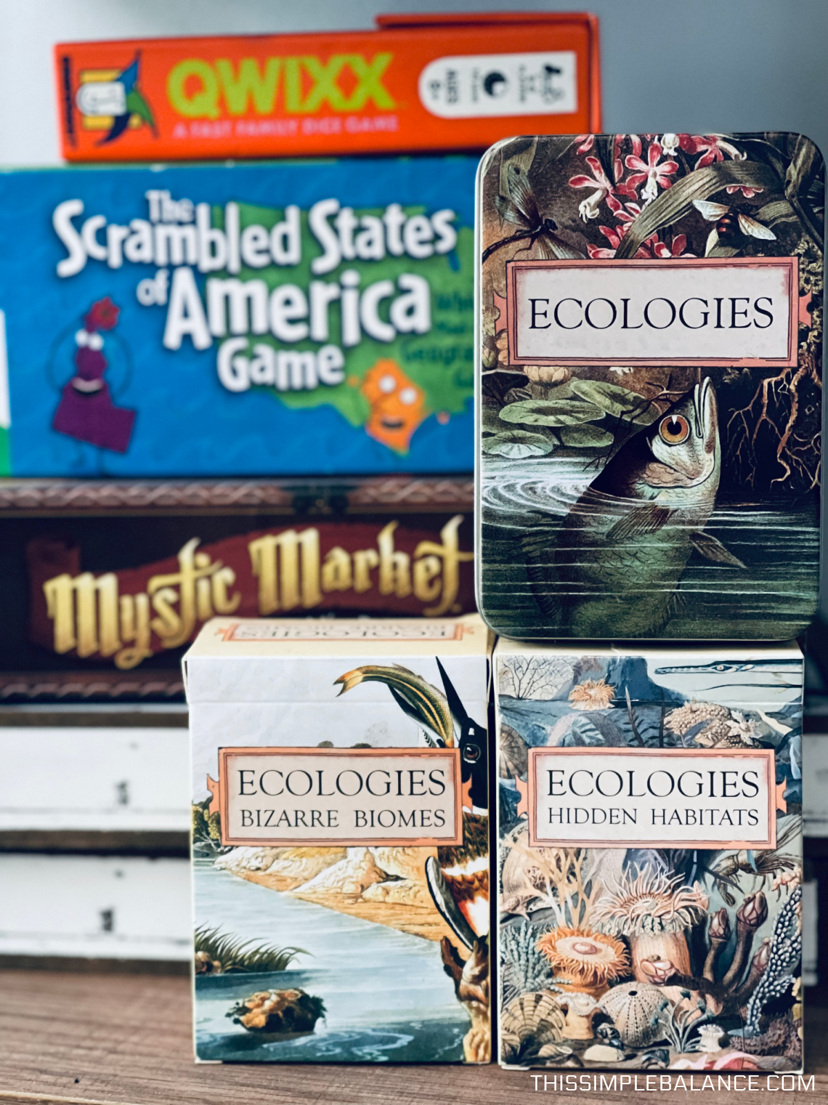 educational board games with Ecologies card games in focus.