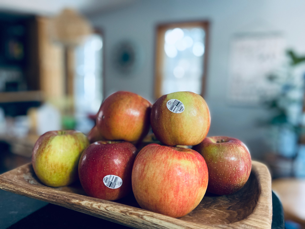 Evercrisp apples in wooden tray.