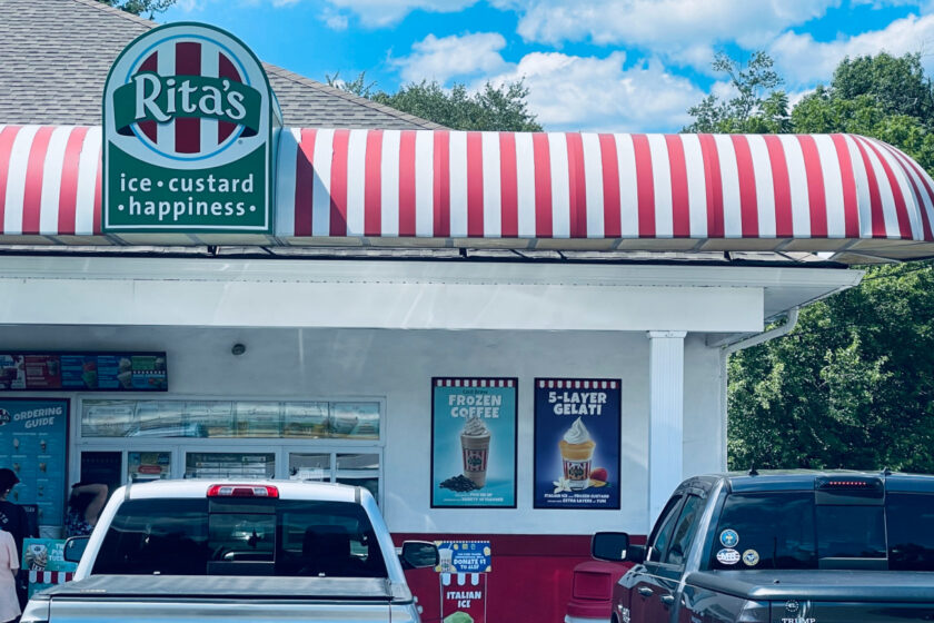Rita's Italian Ice store for Not Back to School Day with cars parked out front.