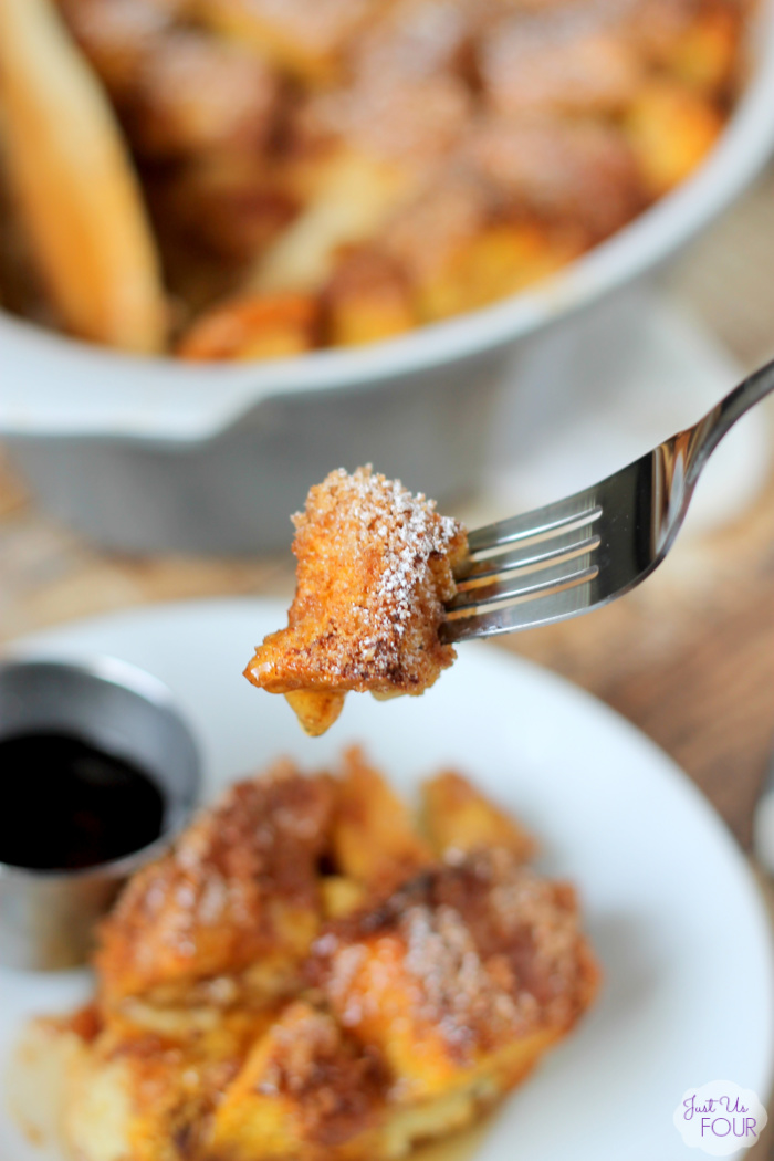 fork with a bite of overnight pumpkin pie french toast on it.