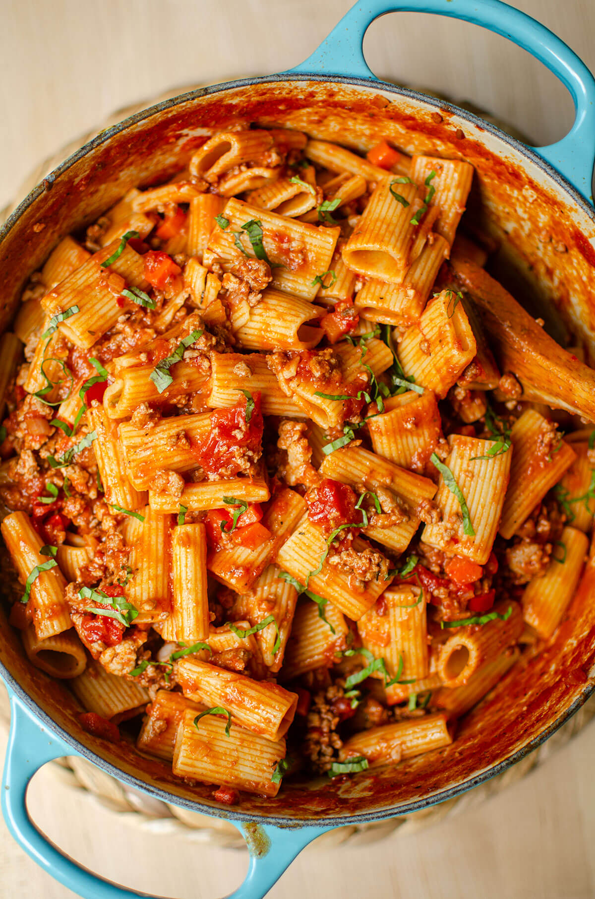 Rigatoni Bolognese in Robin's egg blue dutch oven.