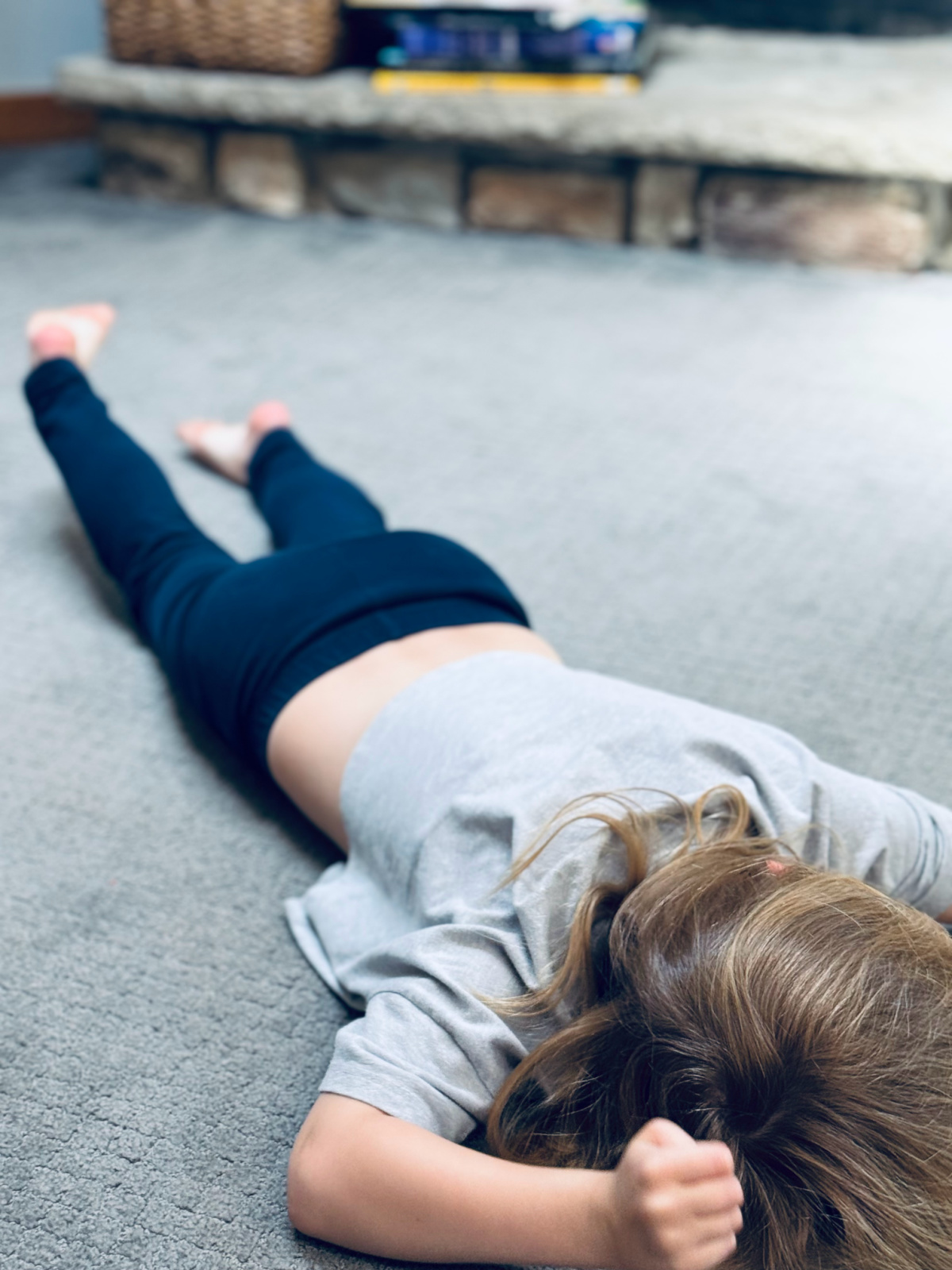 young child tantruming on the floor.