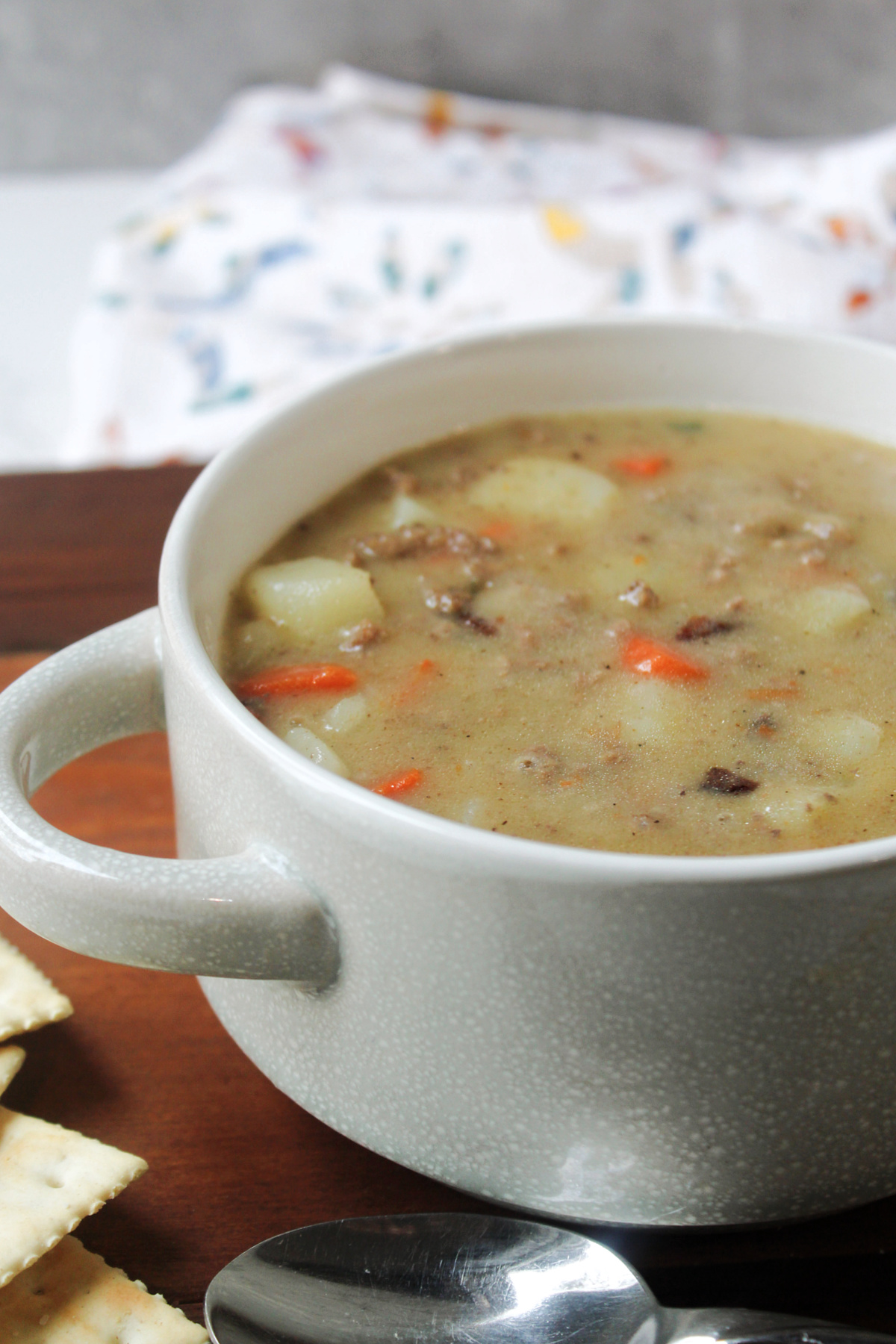 cheeseburger soup in white soup mug.
