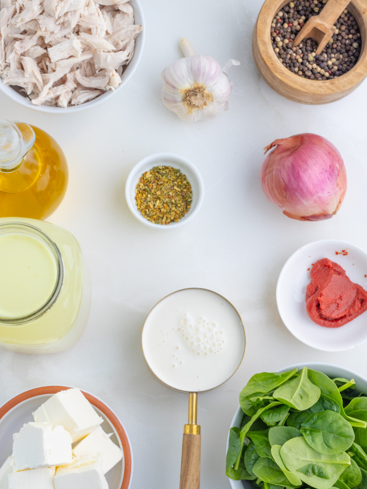 flat lay of ingredients for Marry Me Chicken soup in bowls