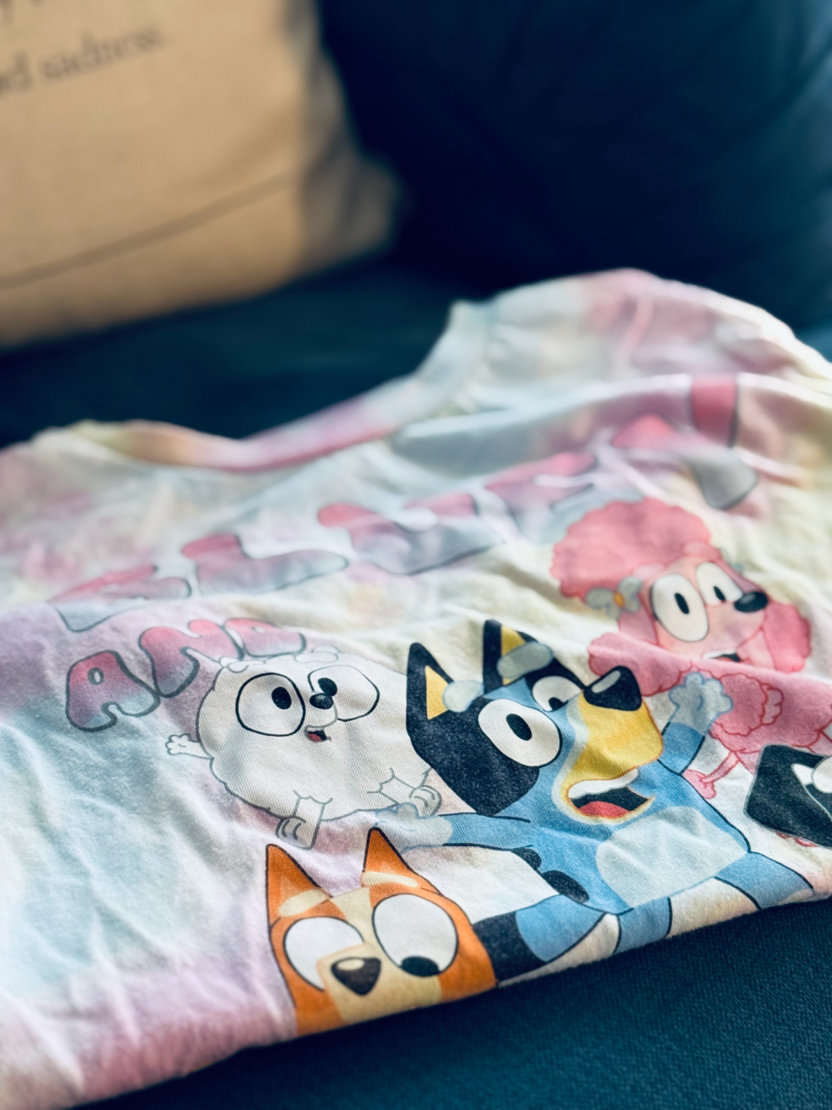 Bluey t-shirt on chair, demonstrating clothes as a great non-toy Christmas gift.