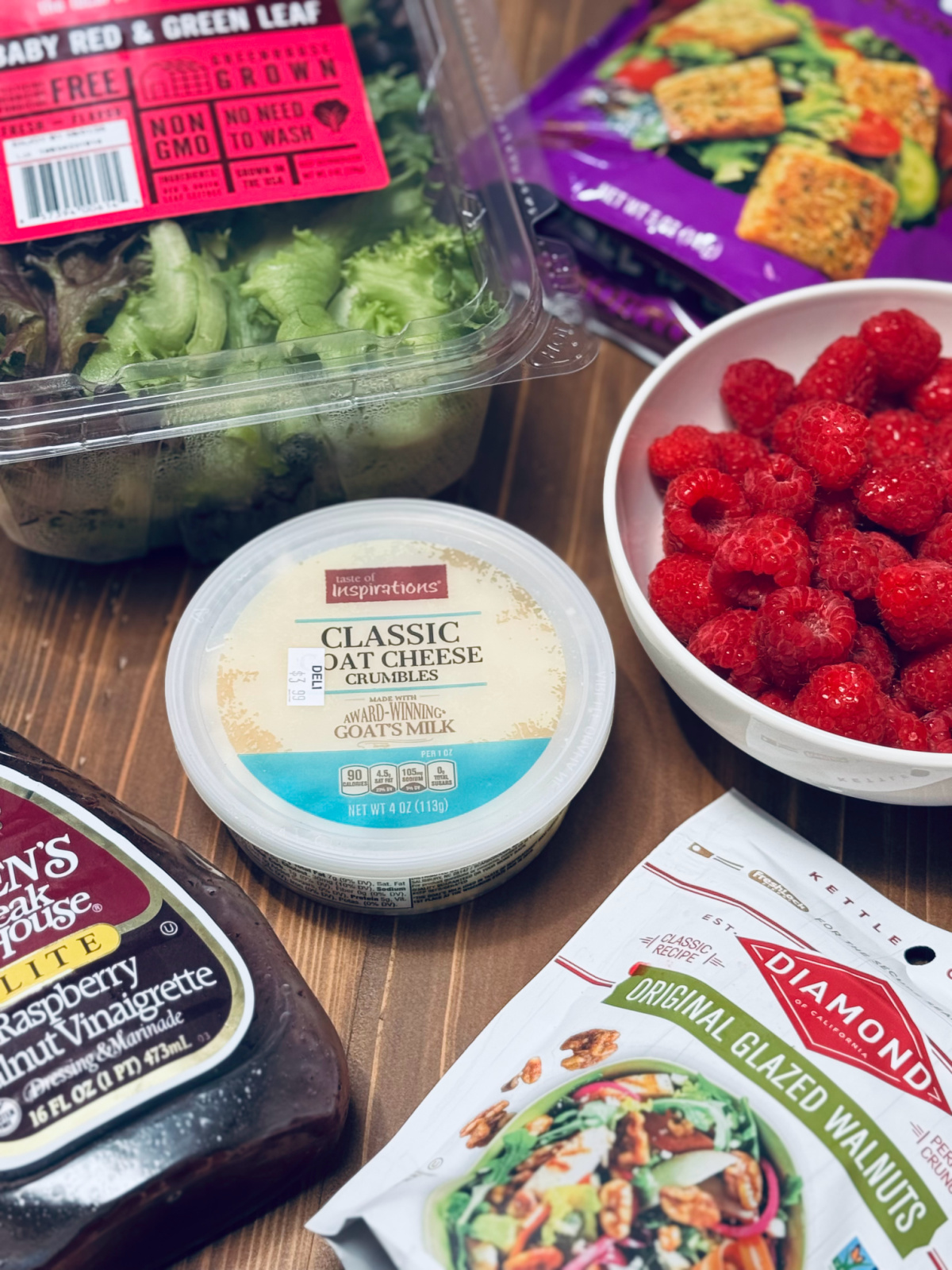 flat lay of ingredients for raspberry walnut salad