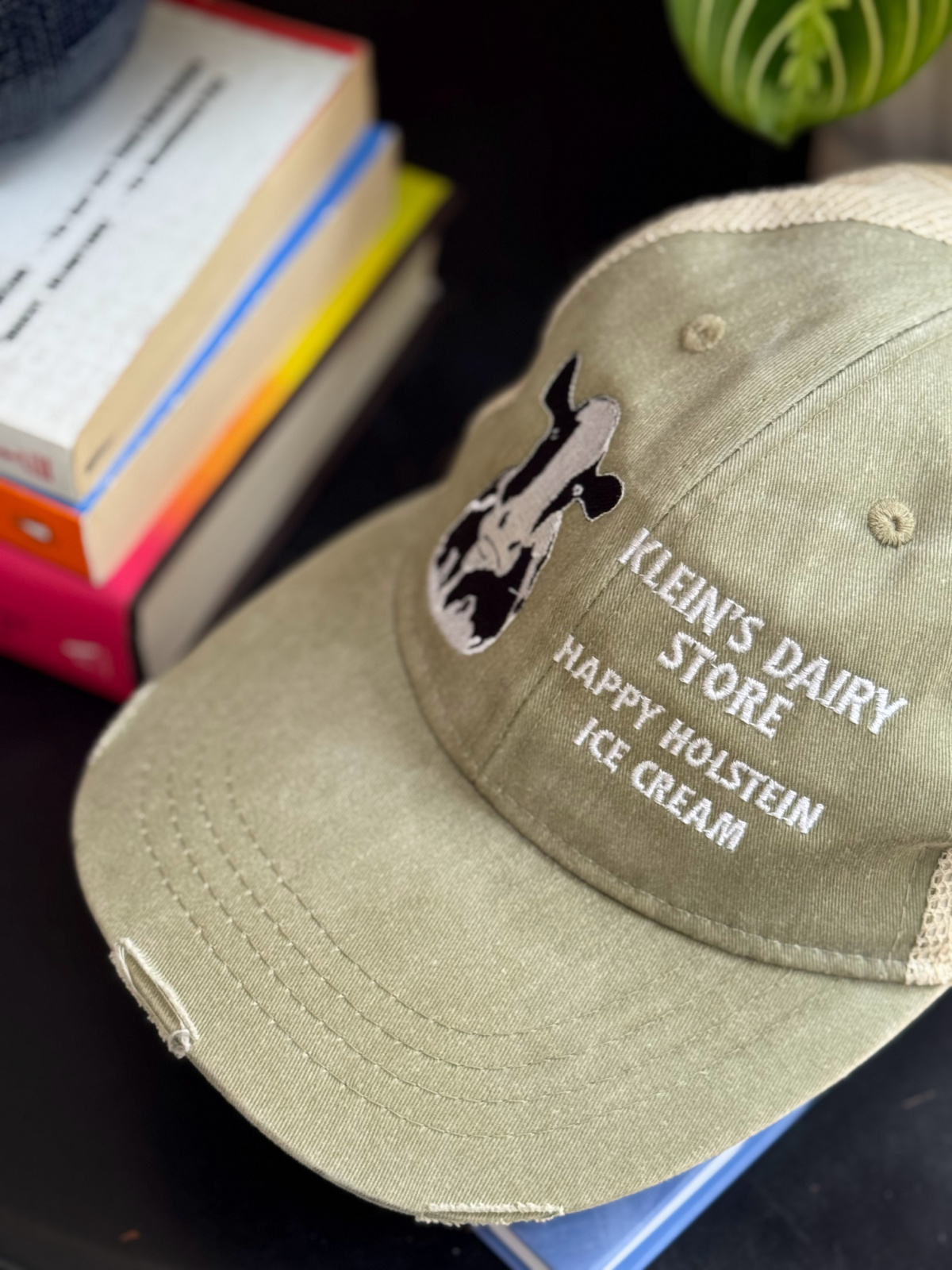 Klein's Dairy Store tan hat with cow.