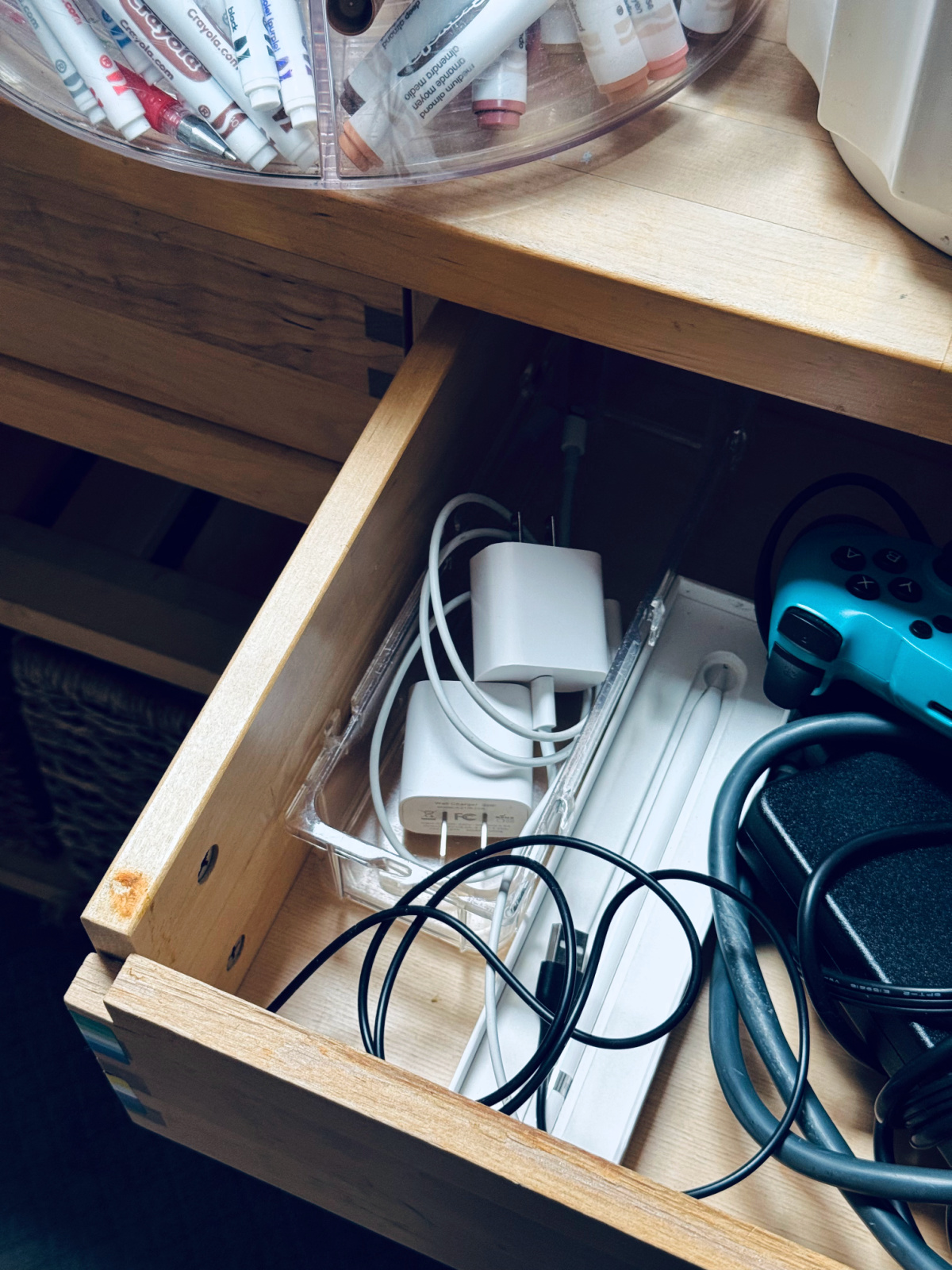 drawer with cords and electronics.