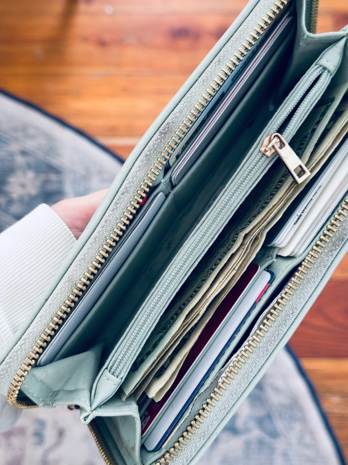 open wallet with cash in it.