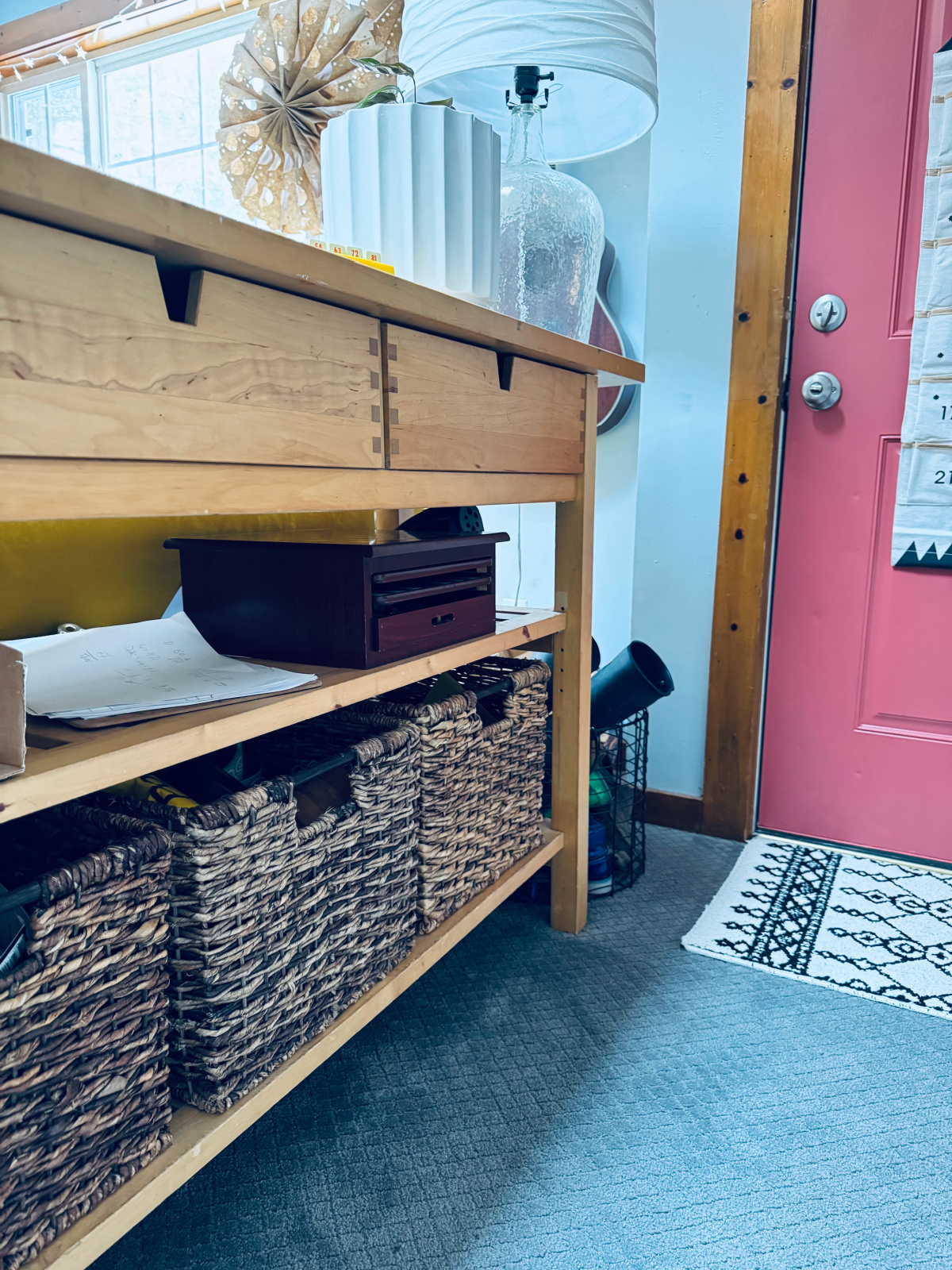 square baskets for organization on shelf.