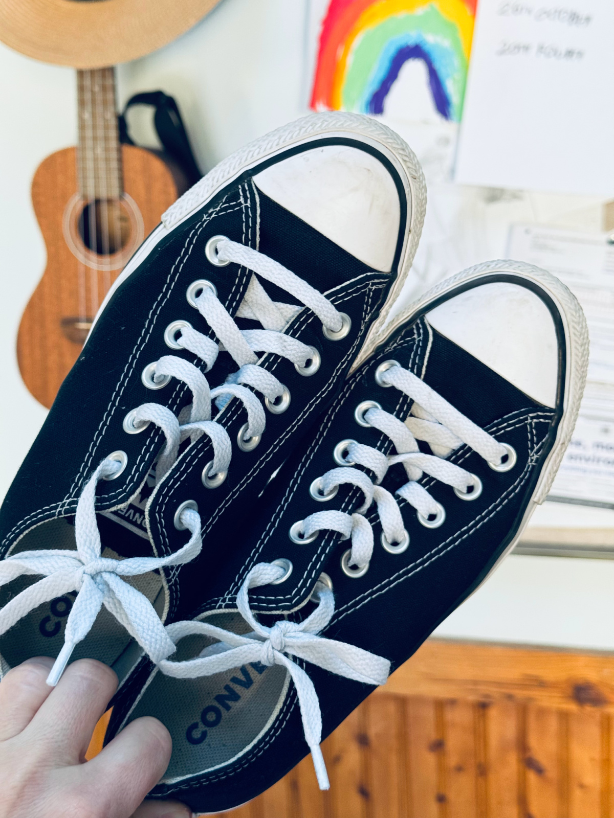 black Converse sneakers close up.
