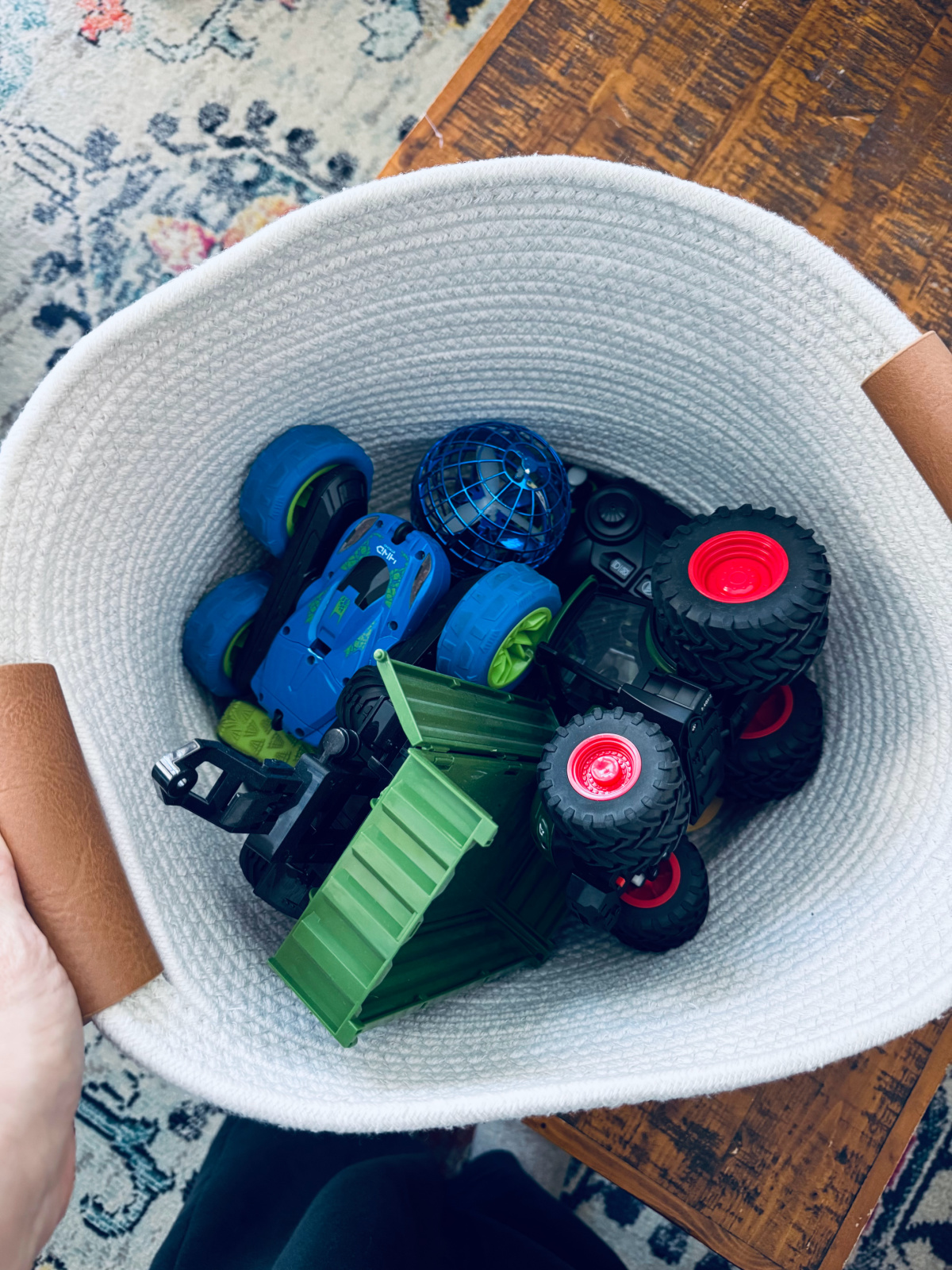 remote control cars in white basket to be decluttered in February. 