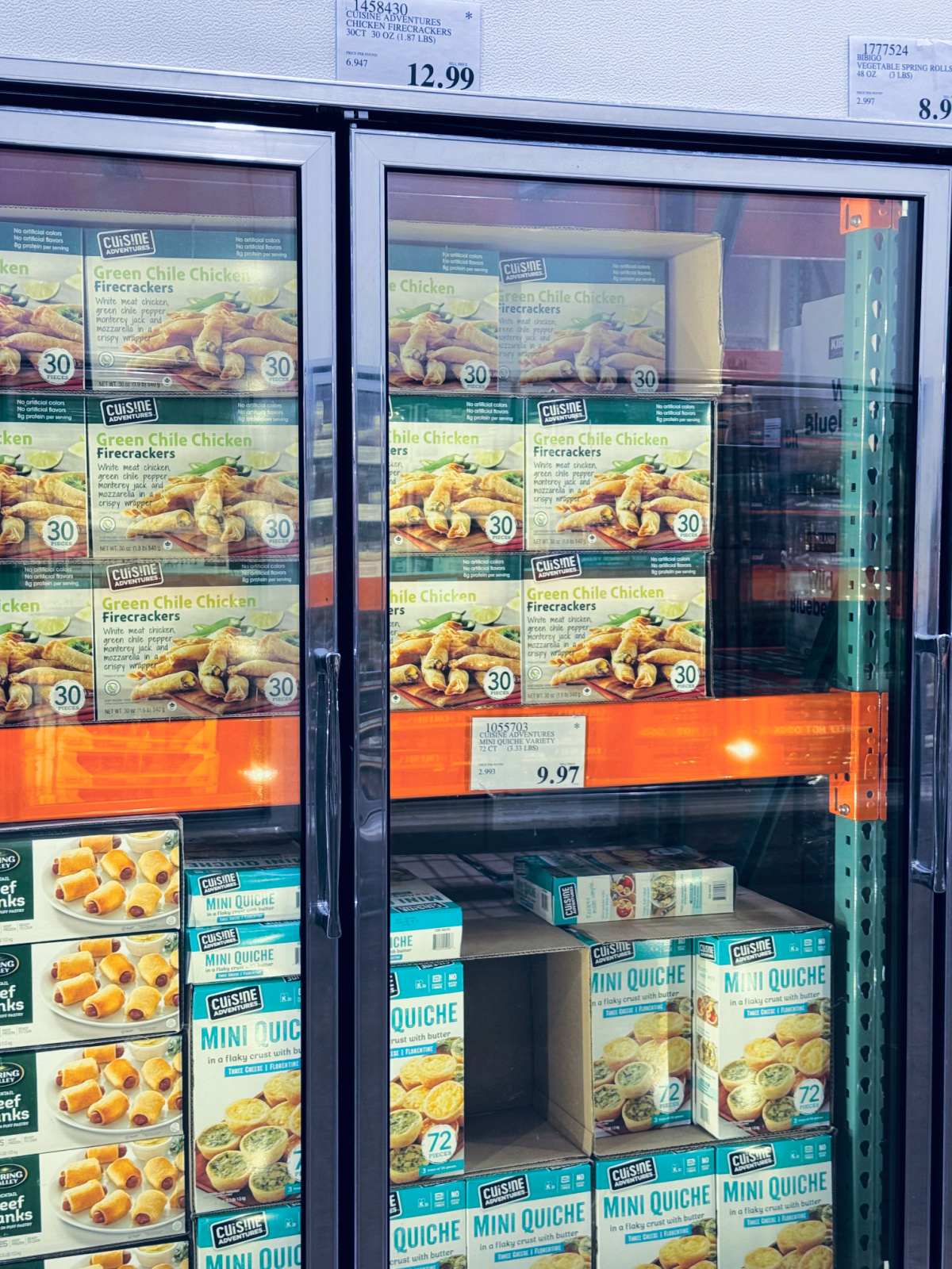frozen section at Costco with Green Chile Chicken firecrackers in focus.